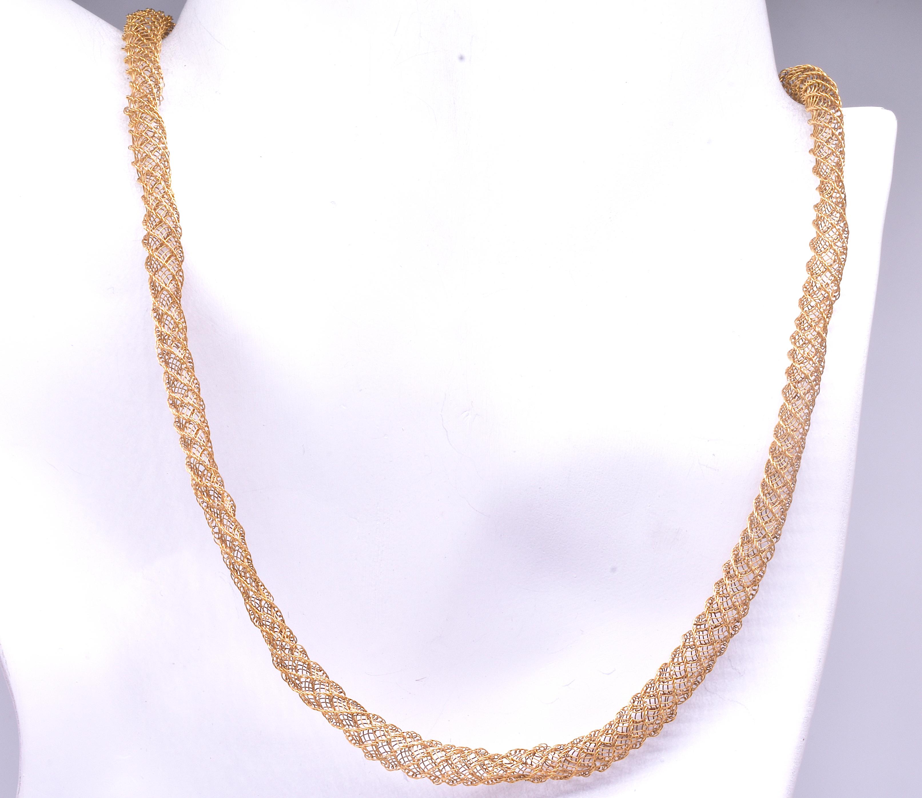 Delicate and ephemeral late Georgian necklace woven from gold to create a light transparent woven gold jewel.  Such necklaces often took the goldsmith weeks to make, and were entirely crafted by hand.

The necklace is lightweight around the neck and