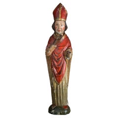 Sculpture en bois du XVIe siècle représentant un cardinal