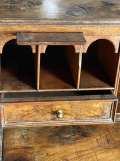 C1700 burr walnut kneehole bureau on original bun feet