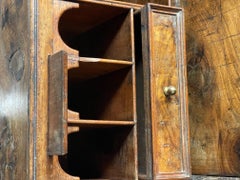 C1700 burr walnut kneehole bureau on original bun feet