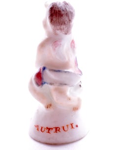 C1745, Chelsea Porcelain Seal Seated Cupid with Spy-Glass, Charles Gouyn Period