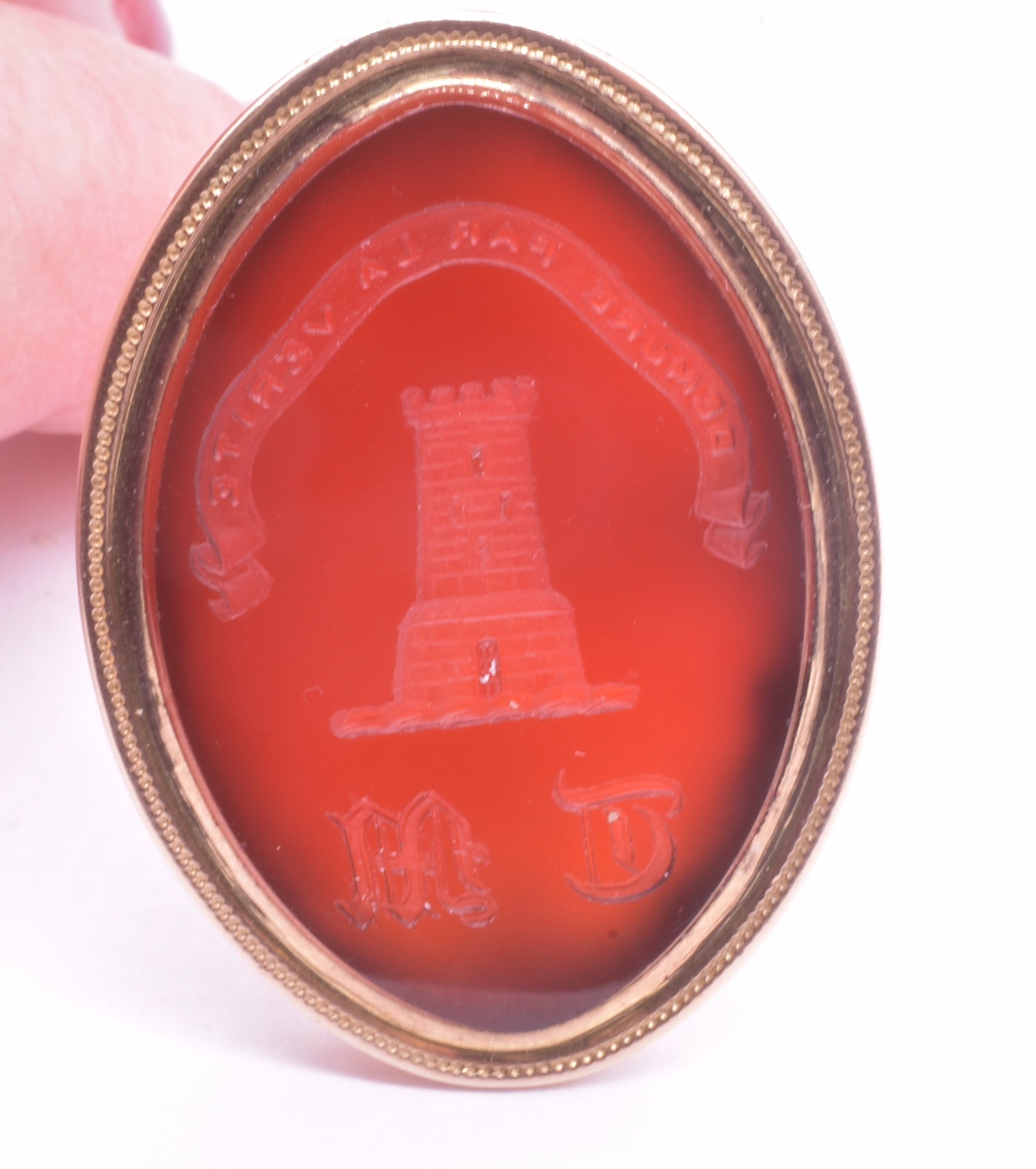 Our 18K Scottish fob features an imposing stone tower, the crest for the Mason surname. The fob reads 