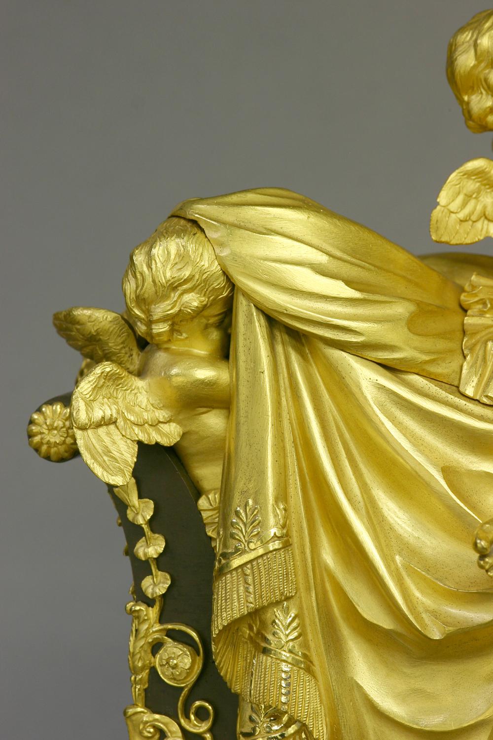 Maker: 
Semaine (Thomas Weeks), clockmaker.
Richard Smith, springmaker
Merfield, dial enameler.

Case: 
The extremely well-cast and finished patinated bronze and ormolu case depicts a partially clad female, dressed in Grecian garb, on a daybed