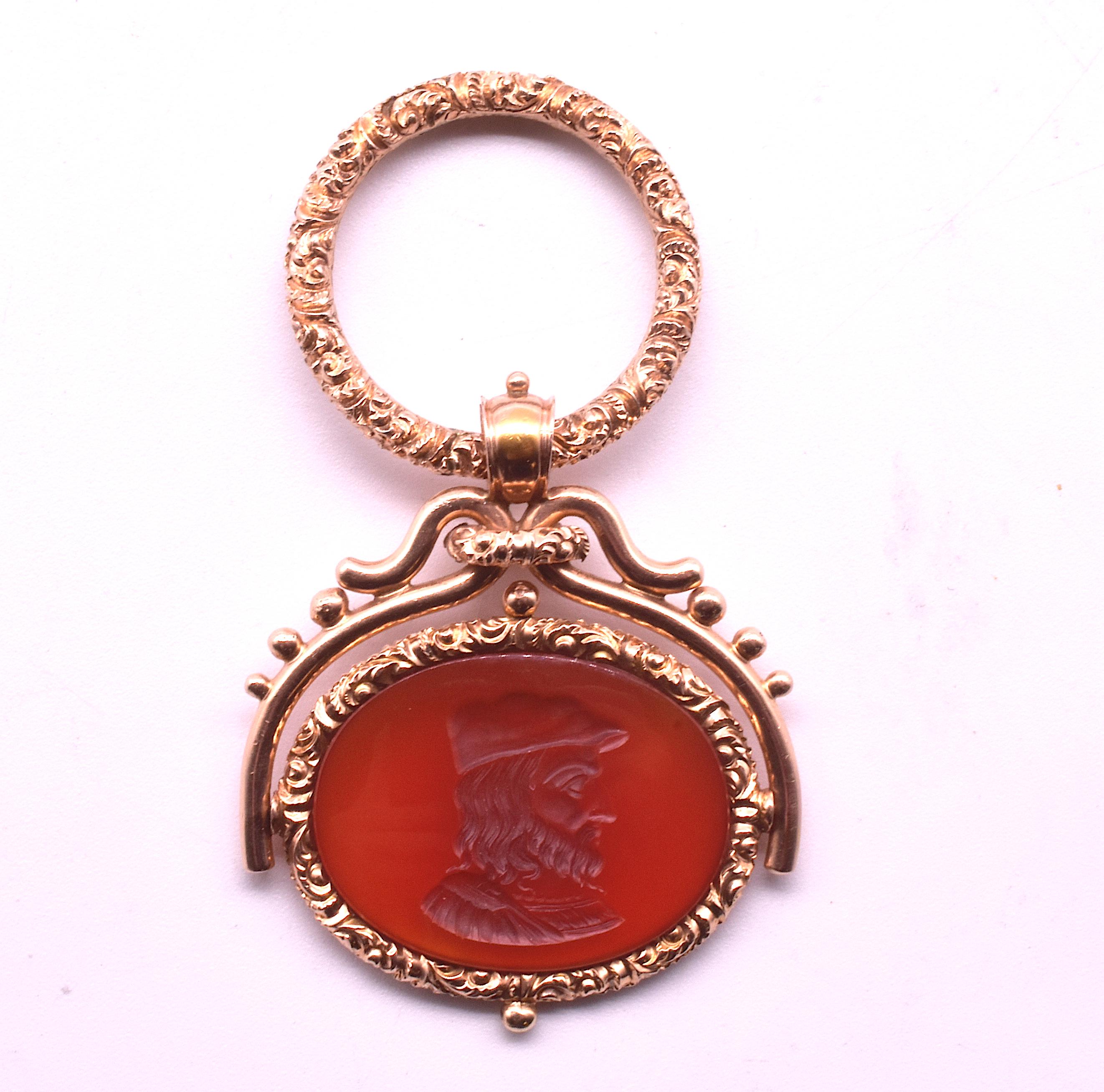 Regency Period, circa 1820 fob seal with a translucent image of an 18th century bearded man in a beret, perhaps robed. This swivel fob is 1 1/4 inches in width with a beauifully carved repousse jump ring that is just shy of 1 inch. This is really a