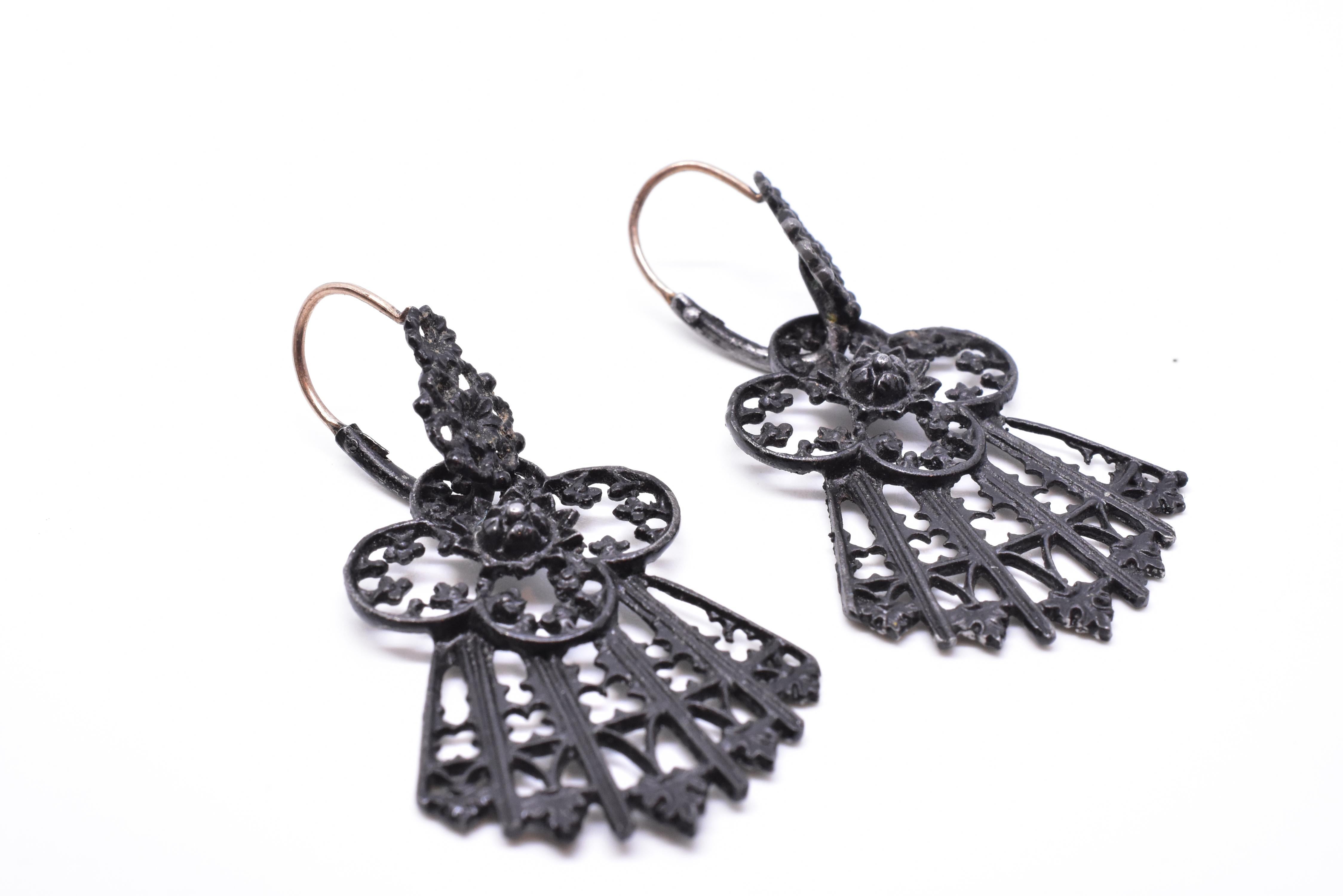 Our Berlin iron gothic revival earrings were made in the early part of the nineteenth century and are a wonderful example of historic jewelry.

Berlin Iron was first made between 1806-1812, around the time of the Napoleonic Wars, when wealthy
