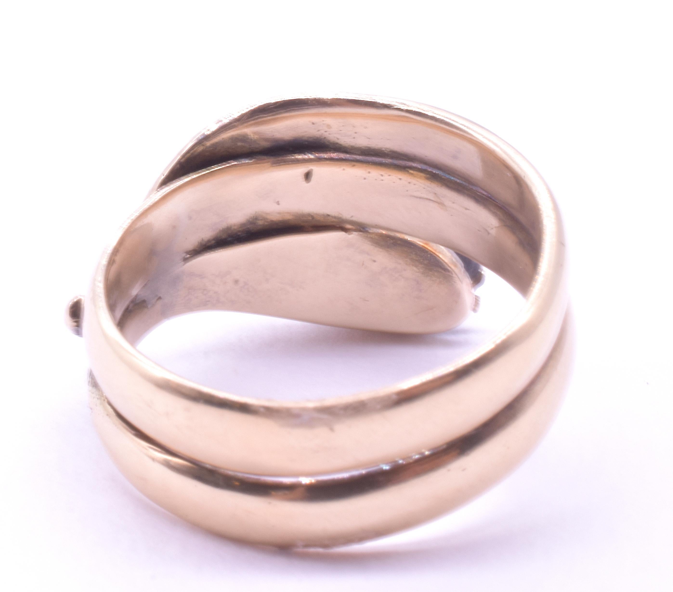 If you are in search of a fabulous snake ring for an engagement or special anniversary gift, look no further. 

Ourearly Victorian snake ring is layered with 5 antique rose diamonds in a graduated formation with the largest diamond in the middle and