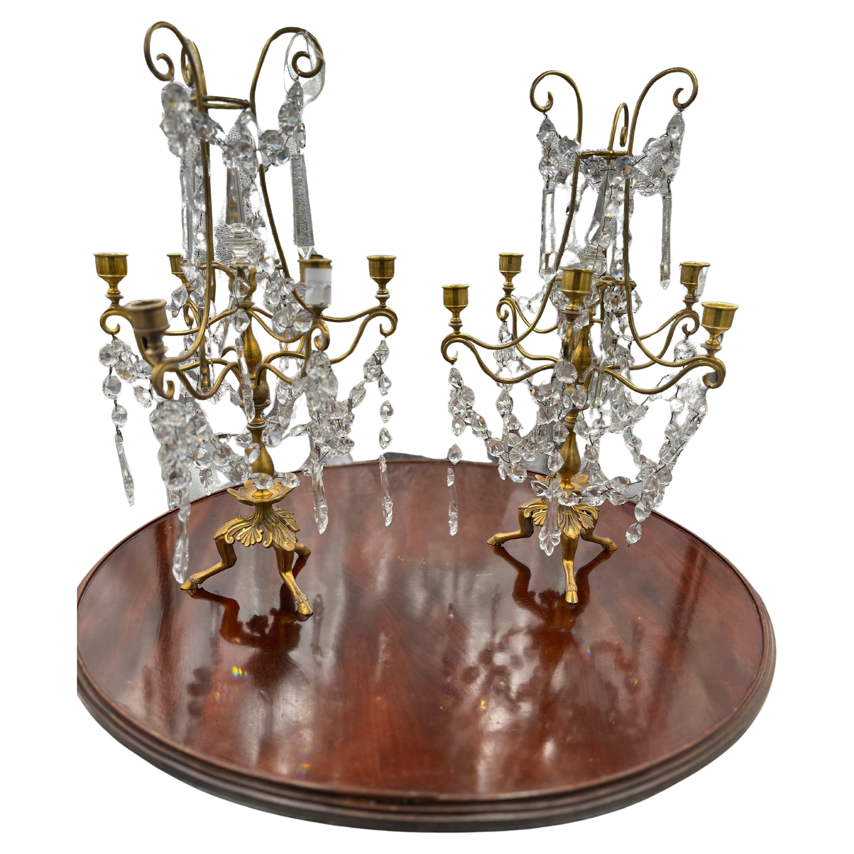 C1860 Coppia di eleganti girandole in bronzo dorato con ornamenti in cristallo