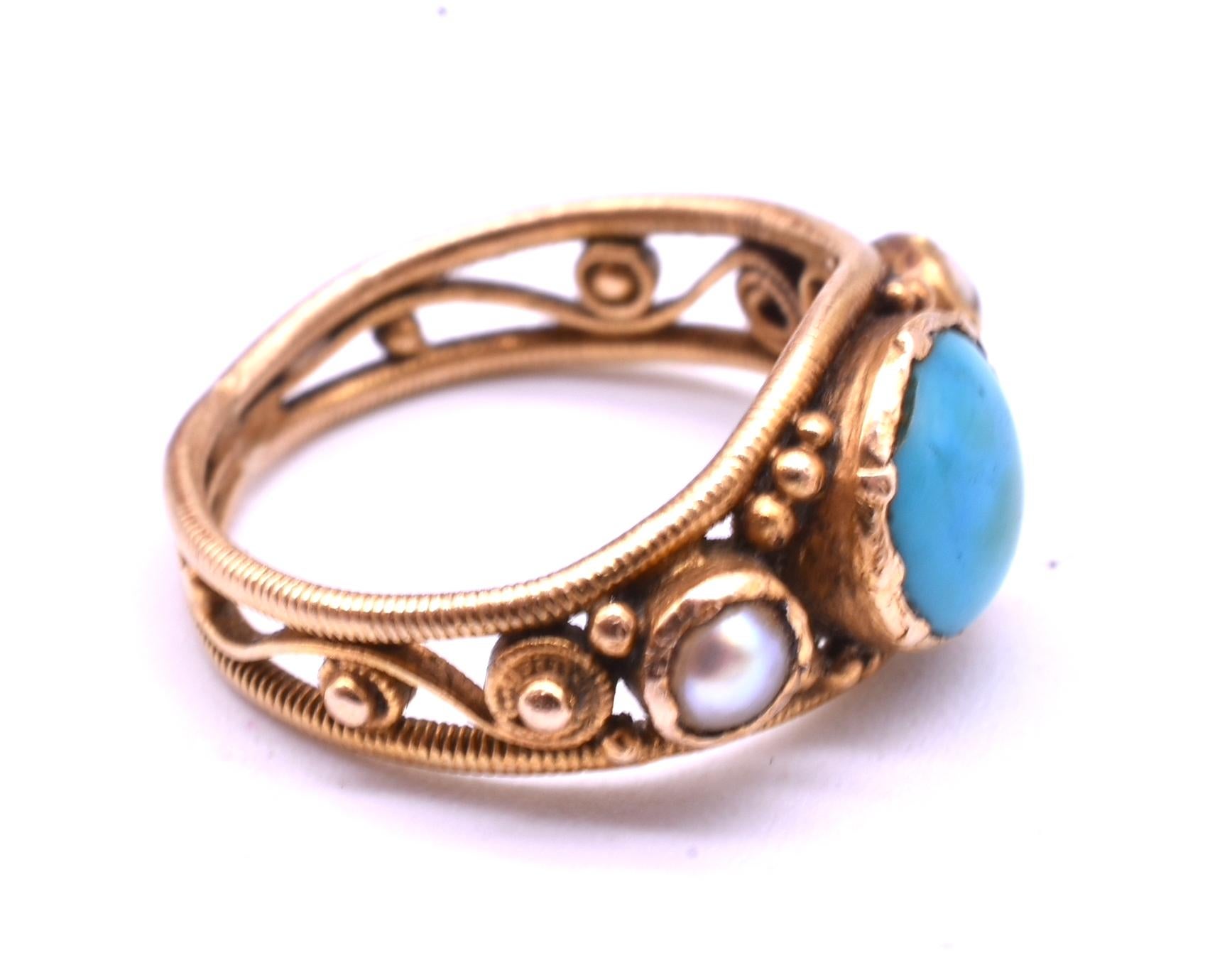 Our early Victorian 15K turquoise and pearl baby ring may be collected in honor of a new baby, worn around the knuckle, or clipped to a split ring and worn around a favorite chain, with or without other baby rings.  Our ring has a center turquoise