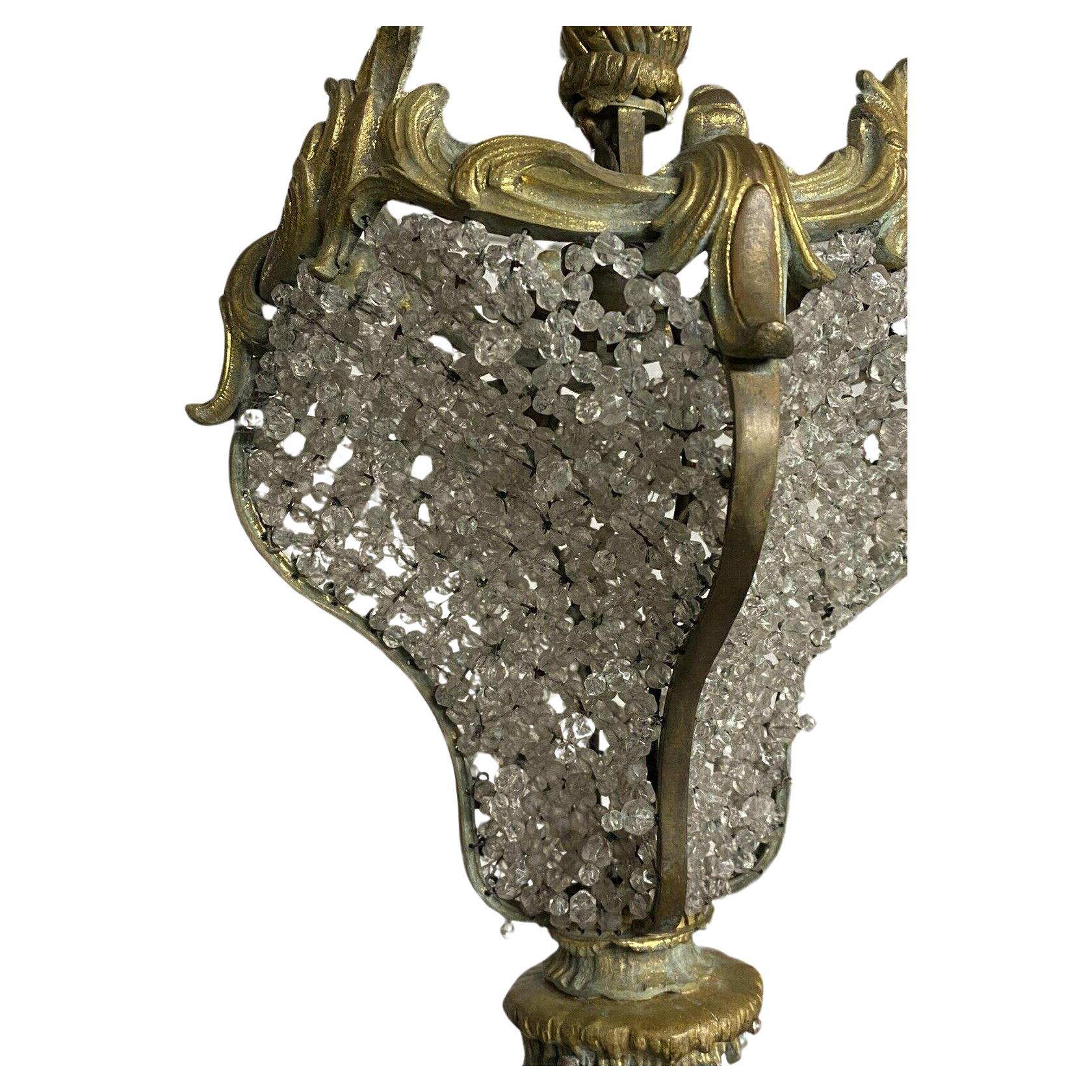 This is a spectacular Lantern Fixture. c1870 French Louis XV Rococo form Gilt Bronze Elaborate Crystal Beaded [on all sides] Ceiling Lantern Fixture. The bead work is stunning and complete. I have not seen a Lantern fixture as beautiful as this