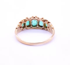 C1880 18K Emerald Five Stone Ring with Fleur De Lis Shoulders