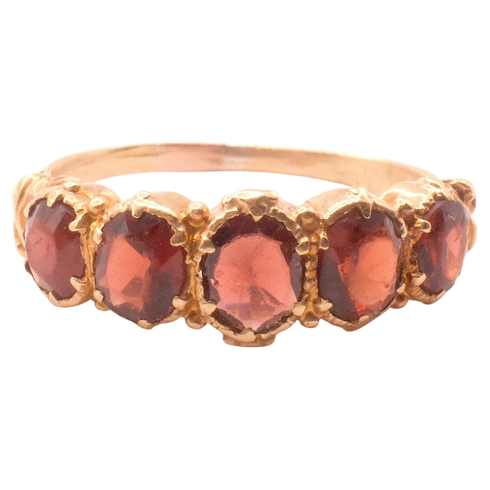 C1880 Bague à cinq pierres en grenat almandin 18K