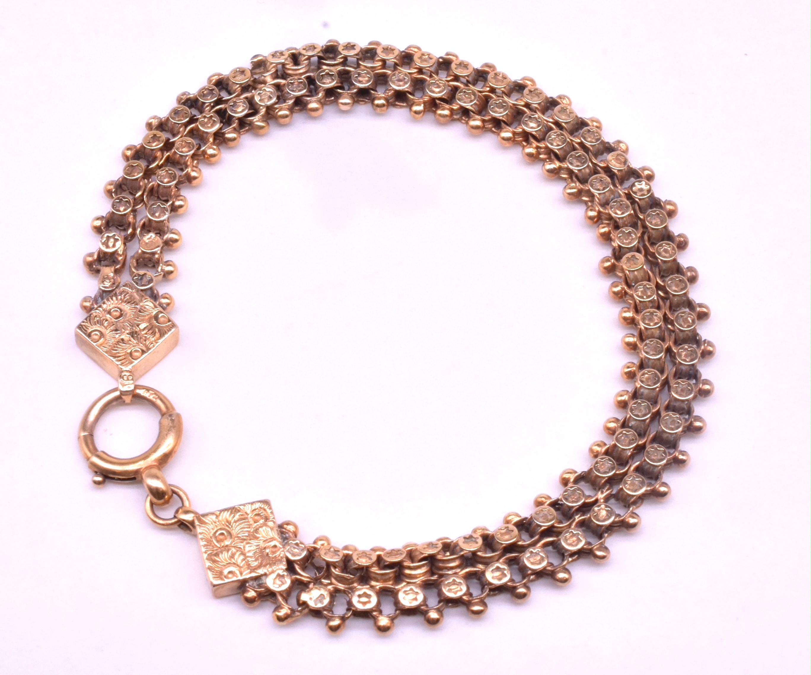 Our star stamped chain link bracelet is made up of two strands of 9 carat gold chains set parallel to each other and soldered together in at three places along the length of the bracelet, which gives it movement. The bracelet has small round links