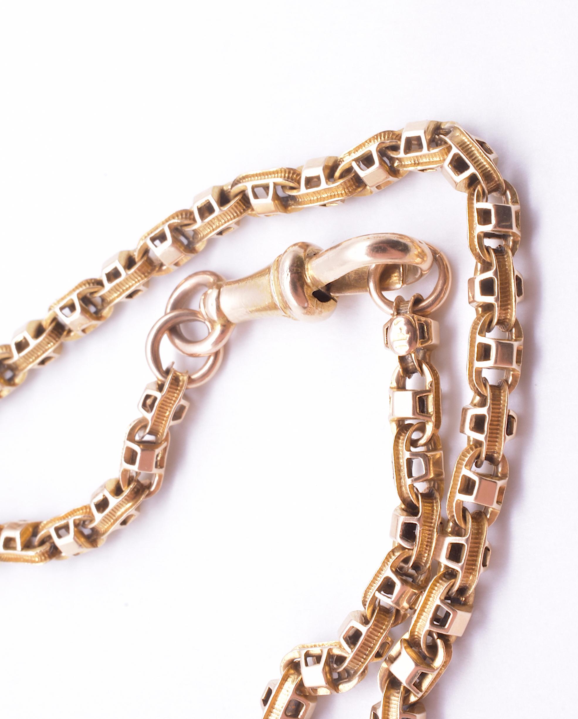 Known as a box link or Venetian chain, this 60 inch Victorian long guard watch chain is hand forged and was made by welding together hollow section rings. Great ingenuity went into the design and making of box link chains, as one can see from the