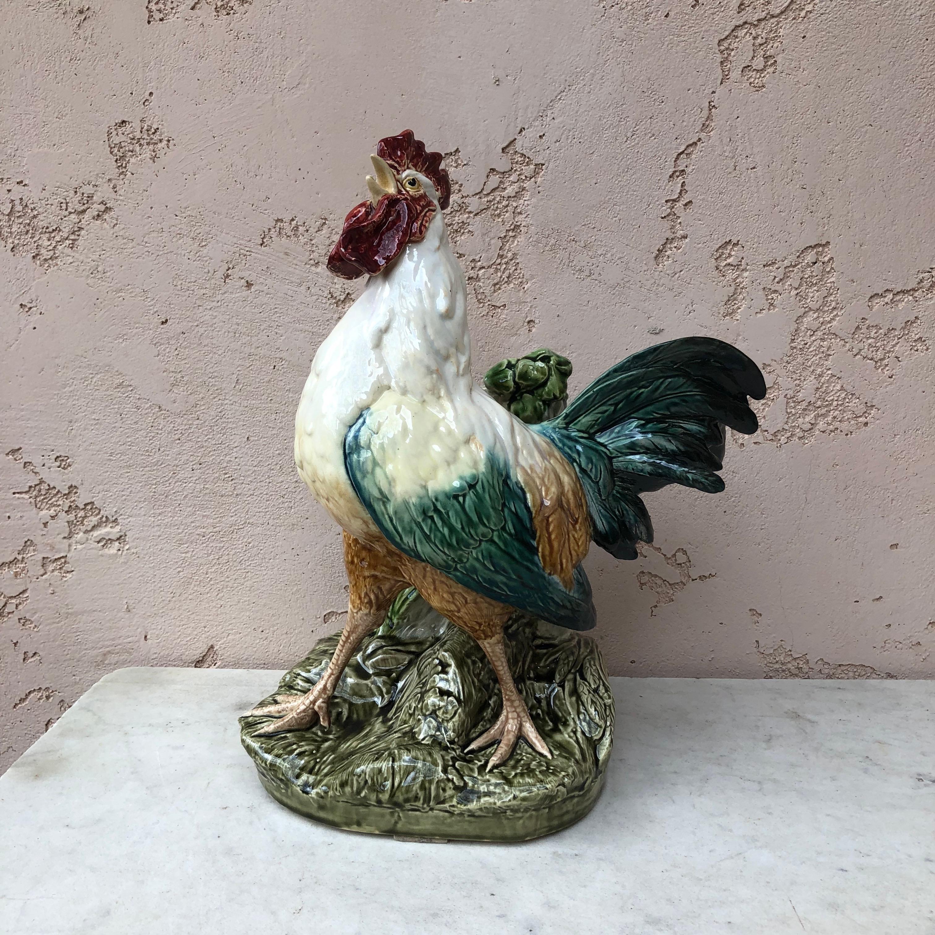 French Majolica rooster vase signed Carrier Belleuse for the manufacture of Choisy le Roi, circa 1875.
Very rare colors.

Albert-Ernest Carrier-Belleuse (born Albert-Ernest Carrier de Belleuse; 12 June 1824 – 4 June 1887) was a French sculptor.