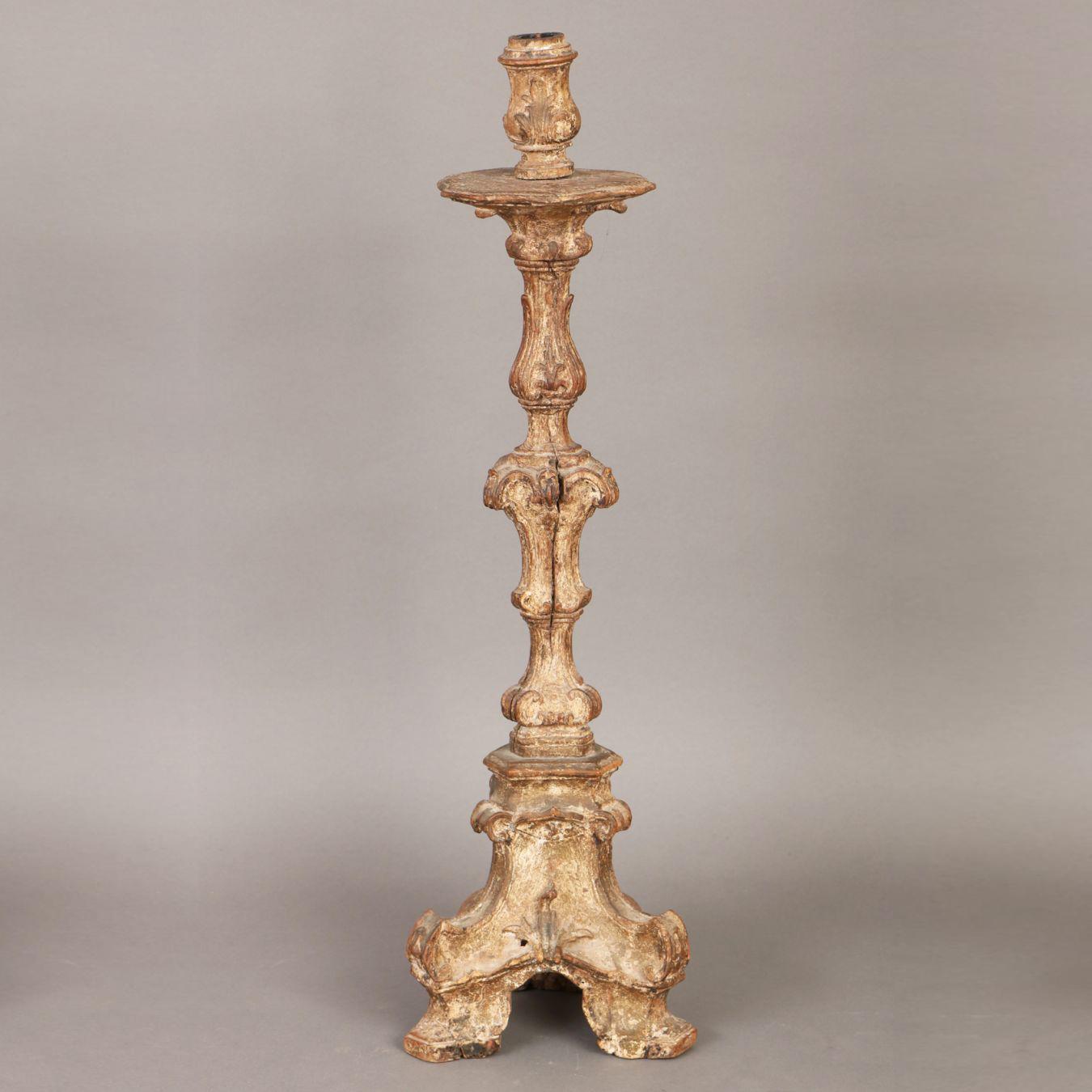 Elegant 18th century Baroque church candlestick with 3-edged baluster shape and vase spout.

Measures: H 69cm.

Good antique condition considering the age.
