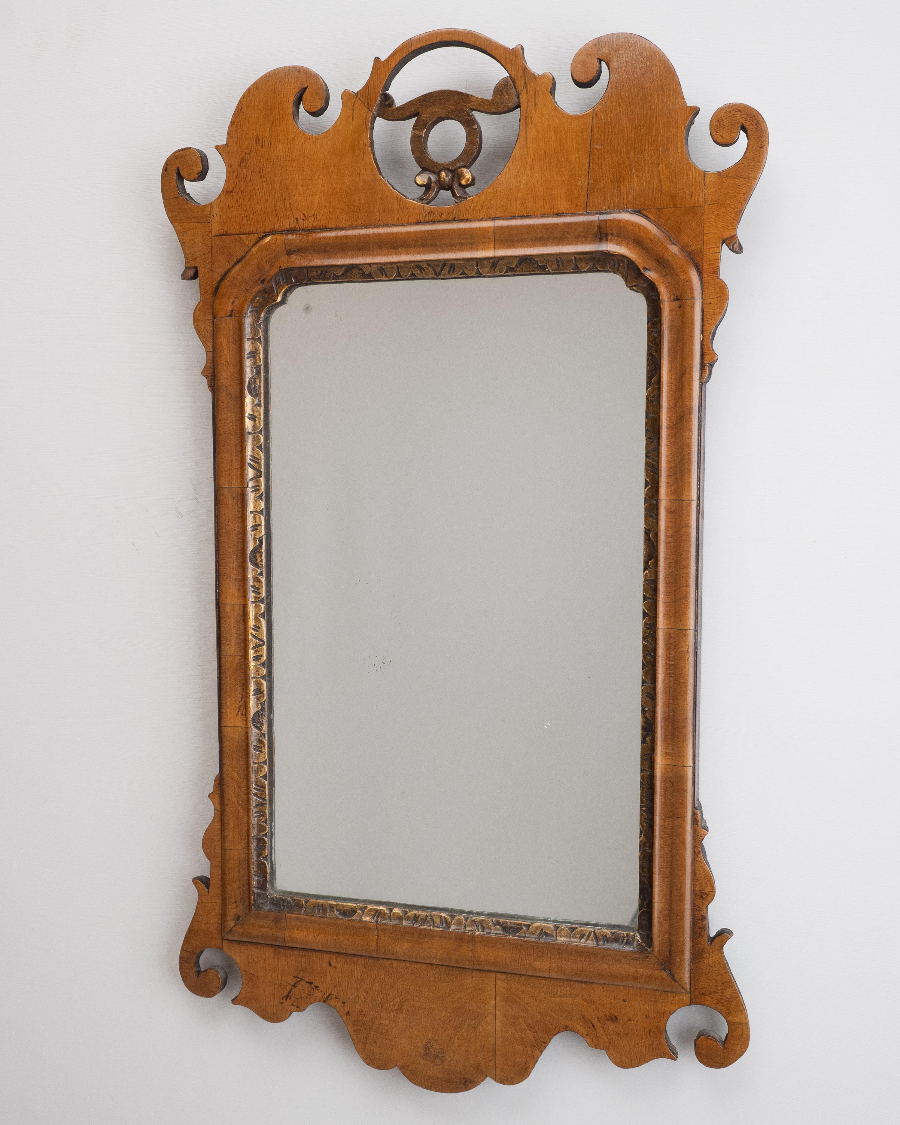18th Century Chippendale-Period Rococo Mirror, Veneered in Sycamore (or Other Pale Fruitwood), Circa 1760–1780

A fine mid-18th century Chippendale-period wall mirror, veneered throughout in sycamore (or another closely related pale fruitwood). The