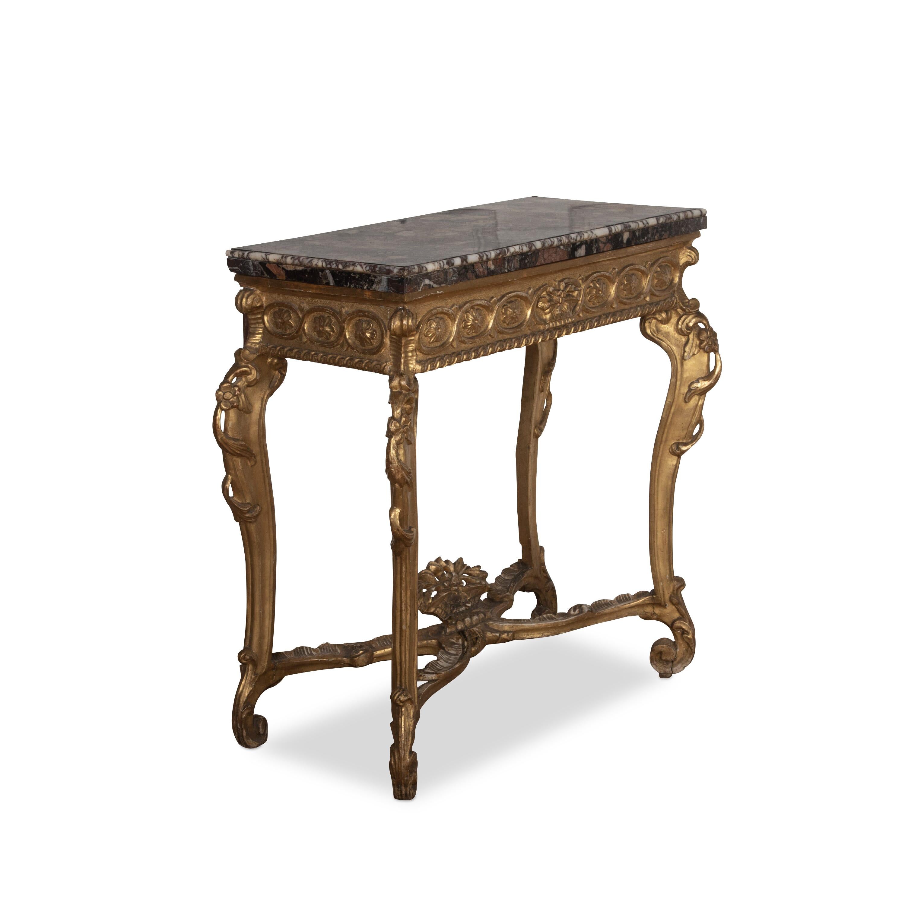A very smart late 18th Century giltwood console/pier table, with its original rare Breccia marble top with pinched moulded edge. The base elegantly carved with rosettes to the frieze and interlaced centred with a basket of flowers, C scrolls corners