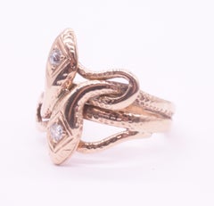 C1900 15K Intertwined Double Headed Snake Ring with Diamonds
