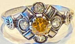 C1900 18K white gold Diamond Cluster ring with center yellow diamond