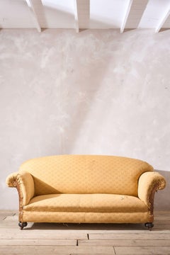 Antique c.1900 Curved back English country house sofa