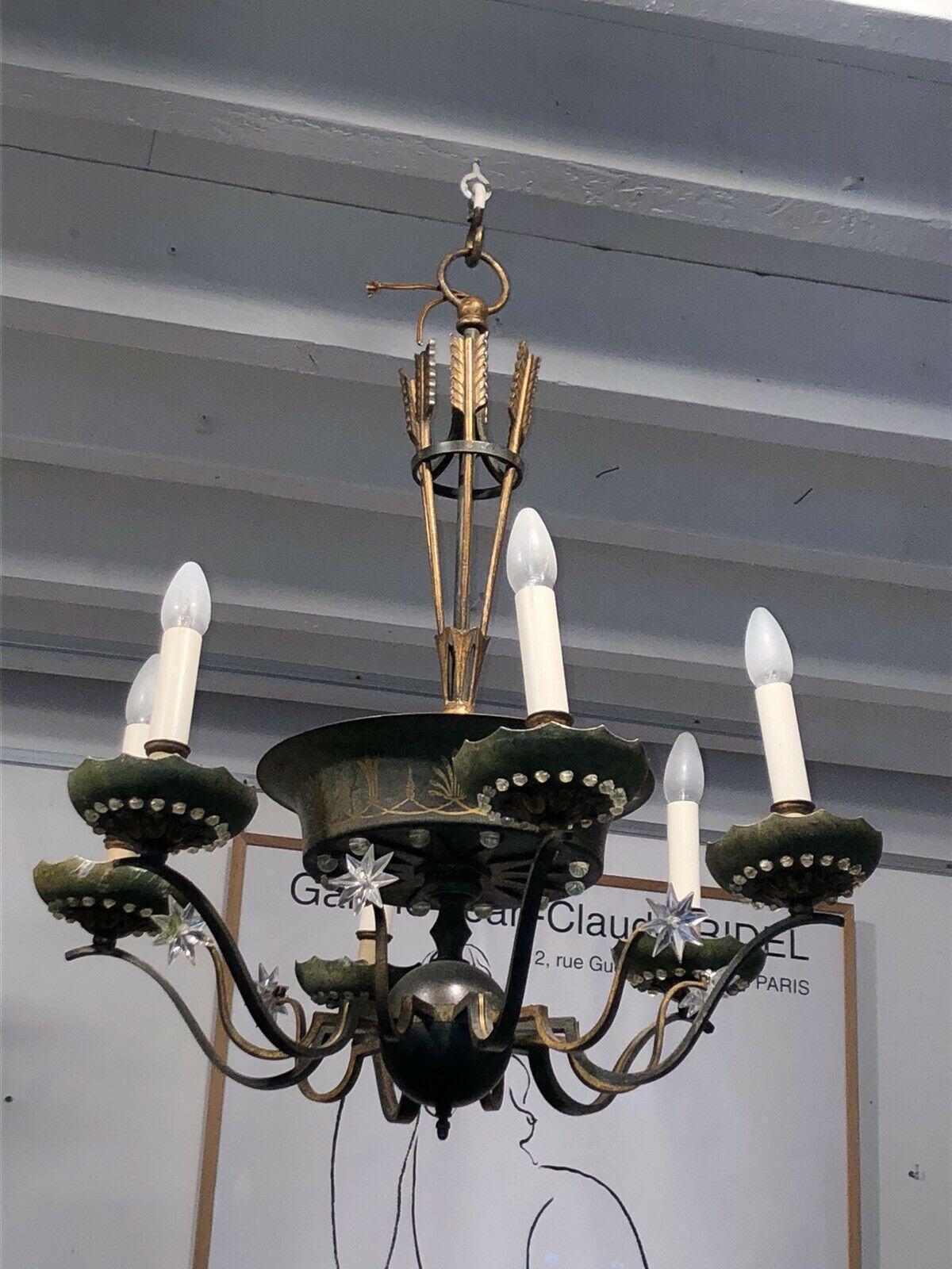 Very Rare 23 Light French Maison Bagues Empire c1900 Gilt Bronze & Tole Chandelier. Quiver/ Arrows and Cut Crystal Star Detail. 2 lights tucked into each bobesche and many more light in the basin. 23 hidden lights. I have never seen anothor like it.
