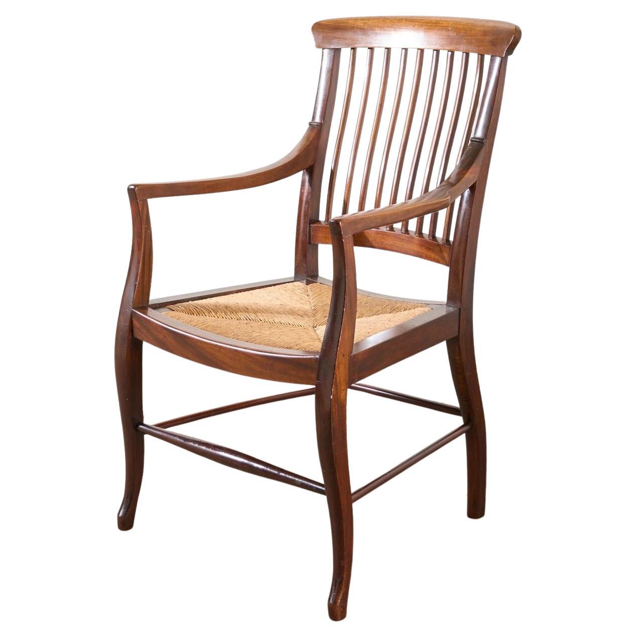 c.1900 Mahogany and rush seated library chair For Sale
