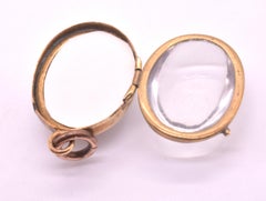 Metal and Glass Pools of Light Locket Pendant, circa 1900