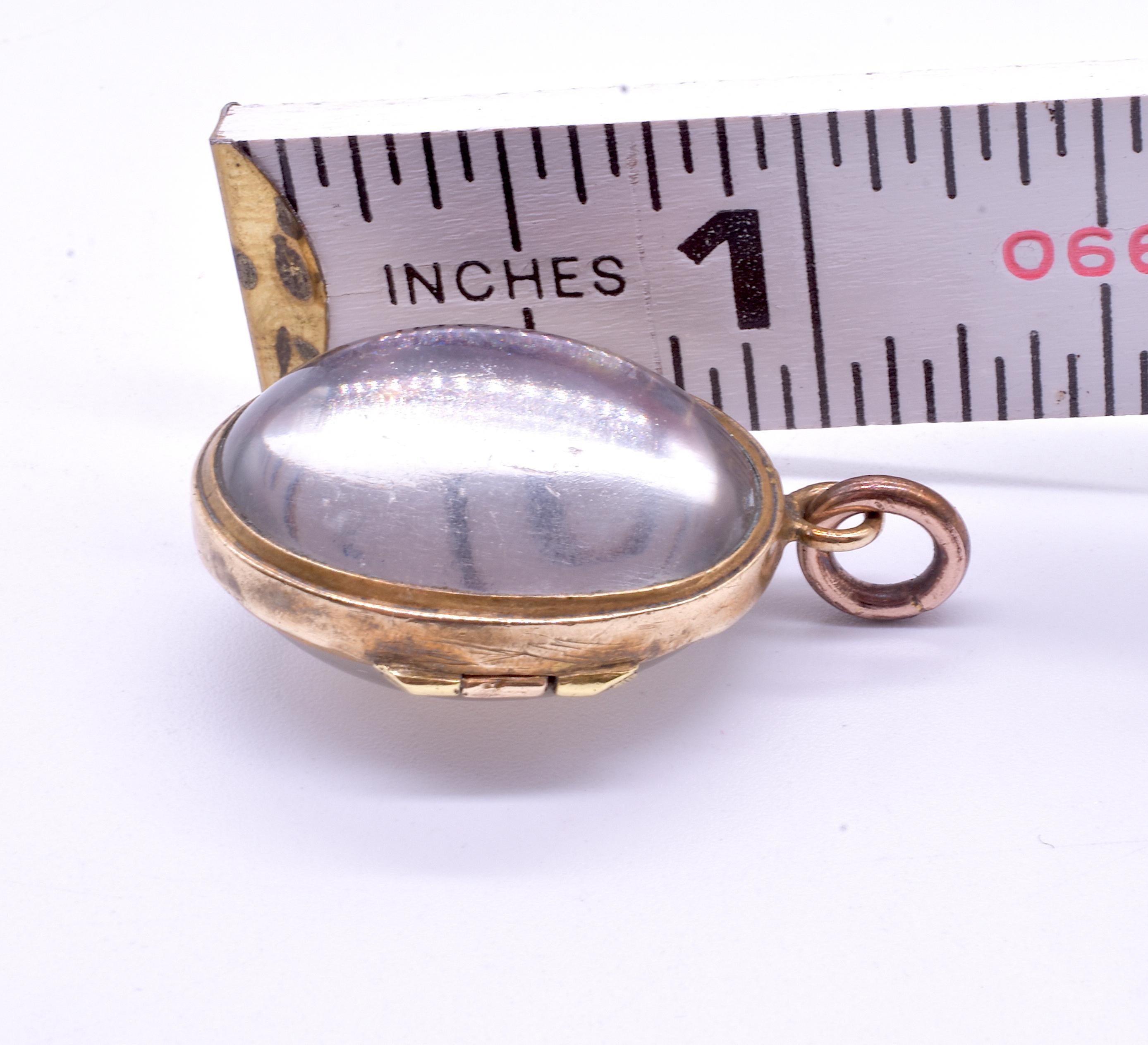 Metal and Glass Pools of Light Locket Pendant, circa 1900 In Excellent Condition In Baltimore, MD