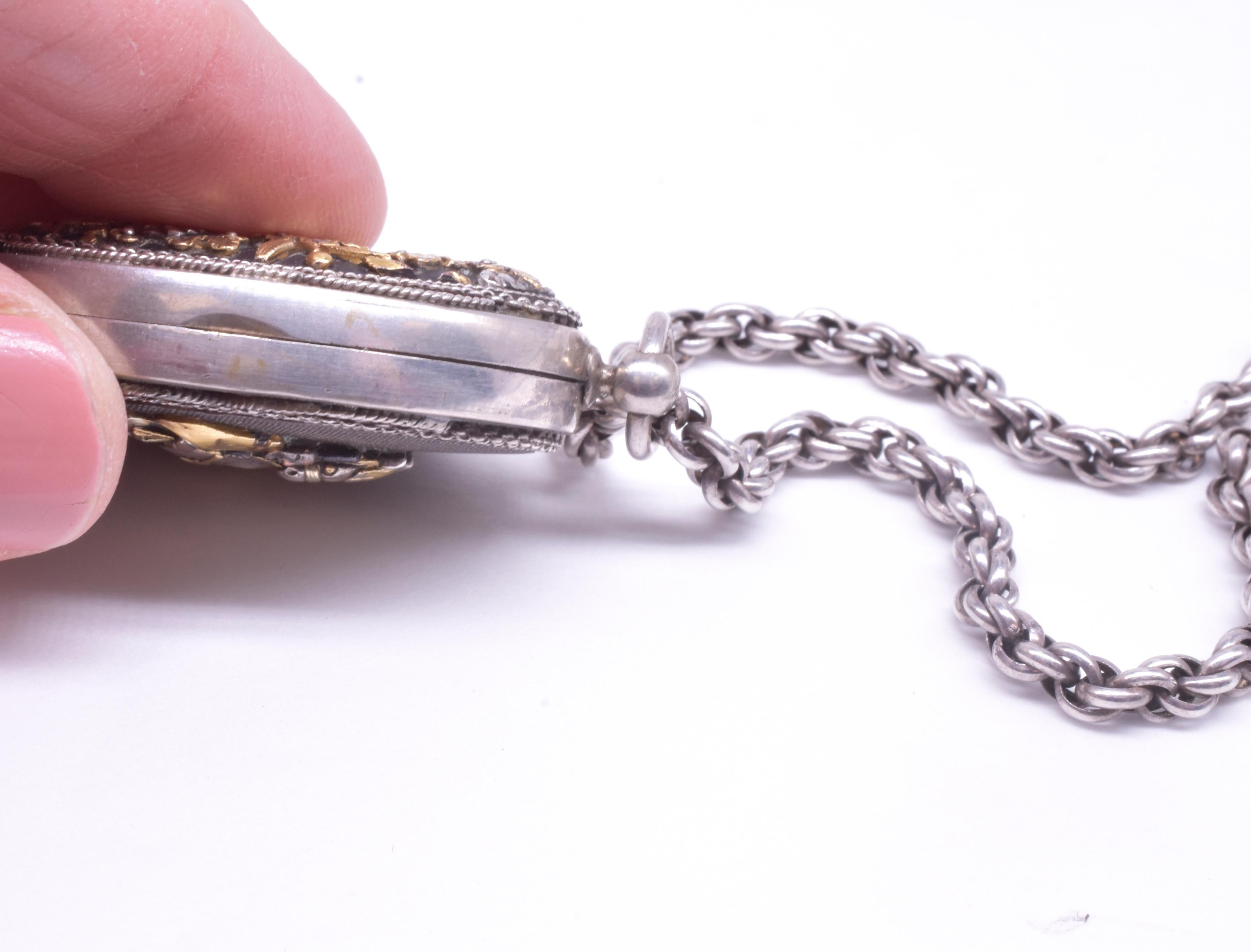 Shakudo Locket and Integrated Chain with Two Enchanting Scenes, circa 1900 1
