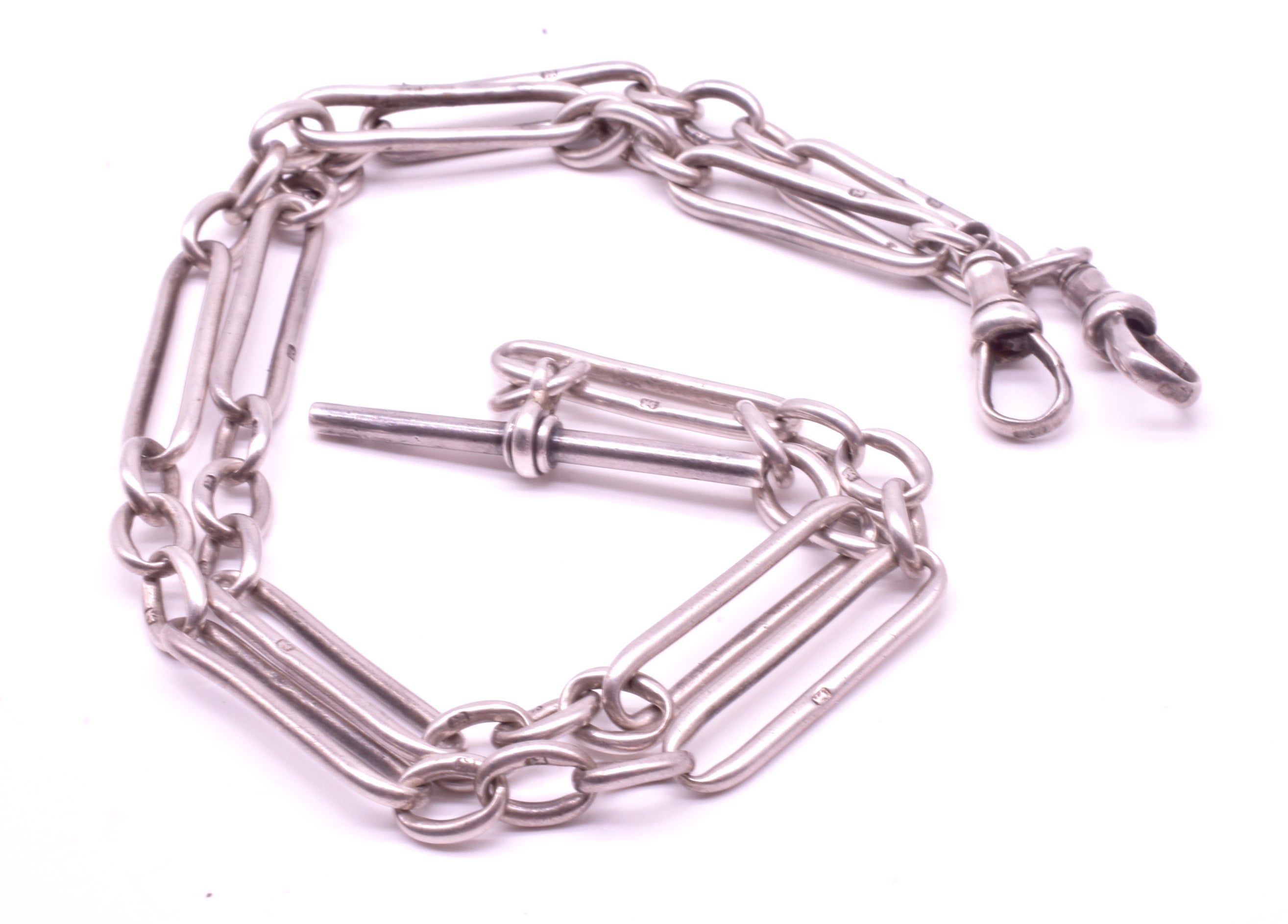 Lovely Victorian sterling silver Albert Link Chain with attached T BAR and 2 dog tag clips from which to attach your favorite locket or pendant or pocket watch. The chain is stamped on every link with the Lion Passant stamp, indicating sterling of