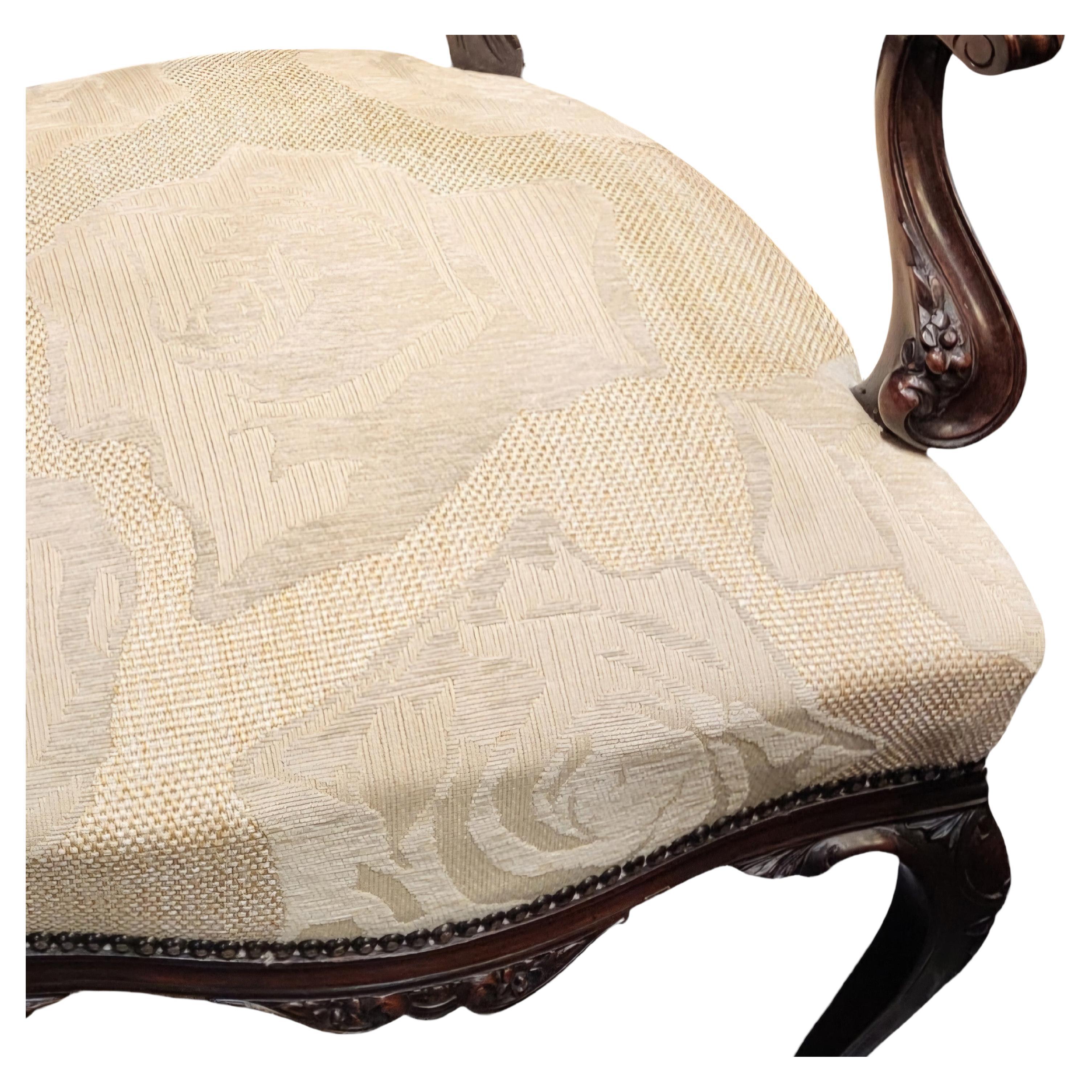 A Lovely Mahogany Finely Carved Arm Chair
Elegantly Shaped Back with very Fine Carving and Raised on Cabrio Legs
This Chair is Very Sturdy and in Excellent Condition
Dates C1900s
Recently upholstered