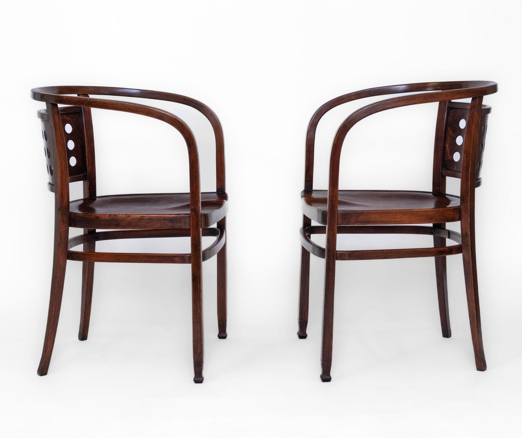 A fabulous pair of Vienna Secessionist bentwood armchairs designed by Otto Wagner (1841-1918). Model 721. Circa 1905.

Manufactured by Jacob & Josef Kohn. Stamped J & J Kohn - Teschen - Austria, along with J. & J. Kohn paper label.

A stylishly