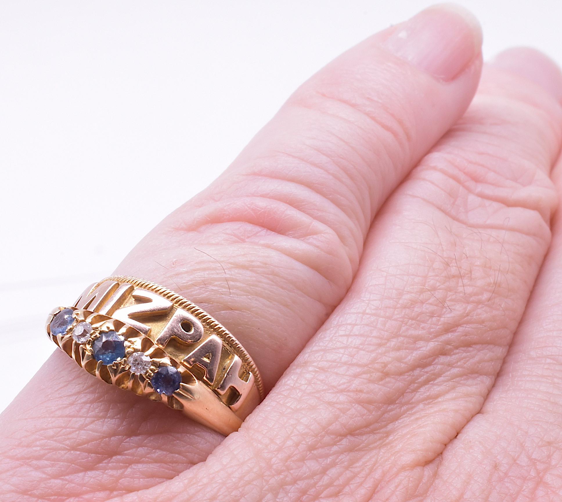 Elegant Edwardian five stone sapphire and diamond band ring shown with one of our gold Mitzvah bands. With its slender profile, this makes a wonderful ring stack.  Shown in one photo with our Mizpah ring and in another, our diamond gypsy ring,