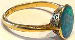 C1910 18K Lightening Ridge Australian Single Stone Peacock Feather Opal Ring