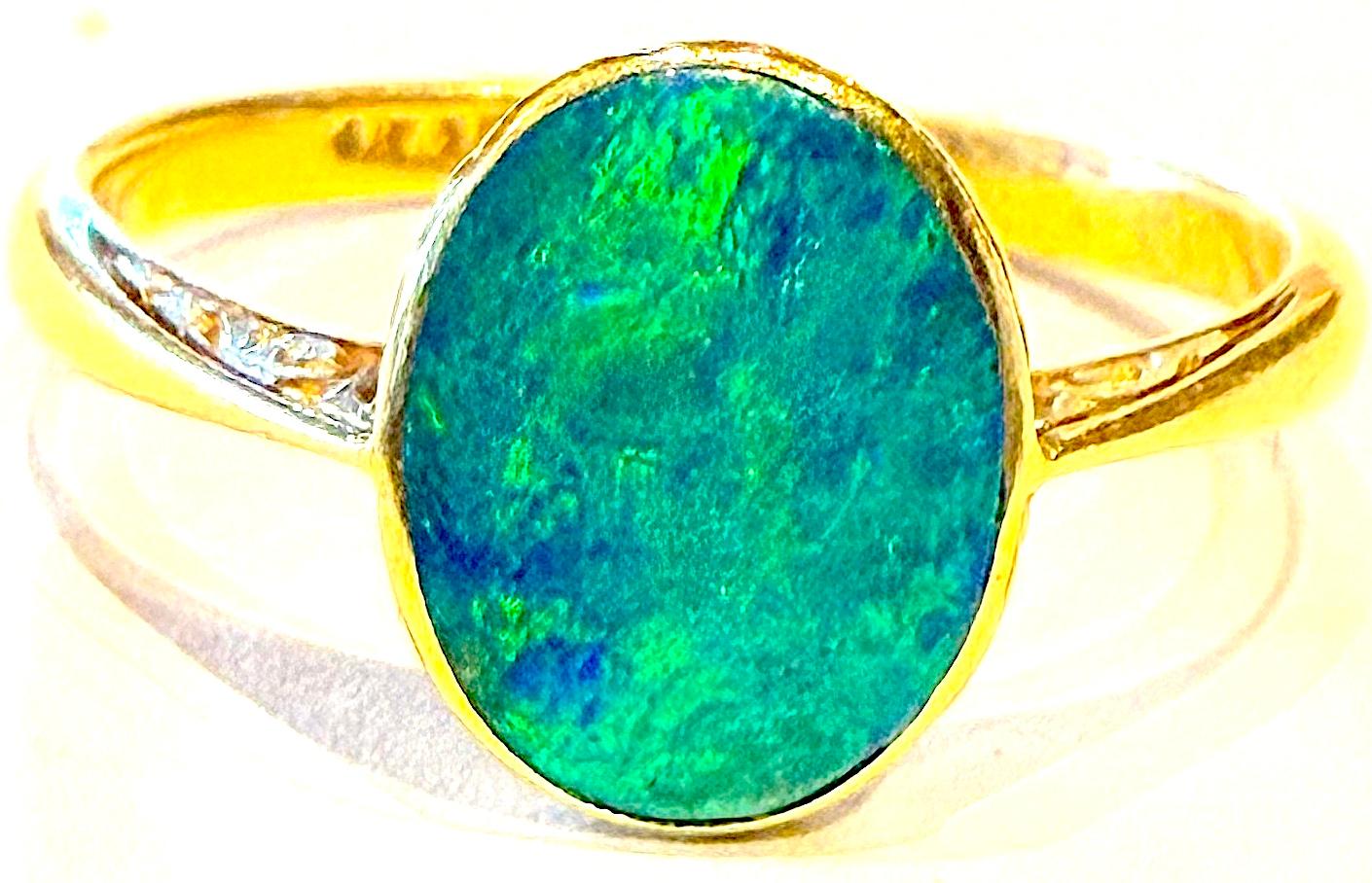 Oval Cut C1910 18K Lightening Ridge Australian Single Stone Peacock Feather Opal Ring For Sale