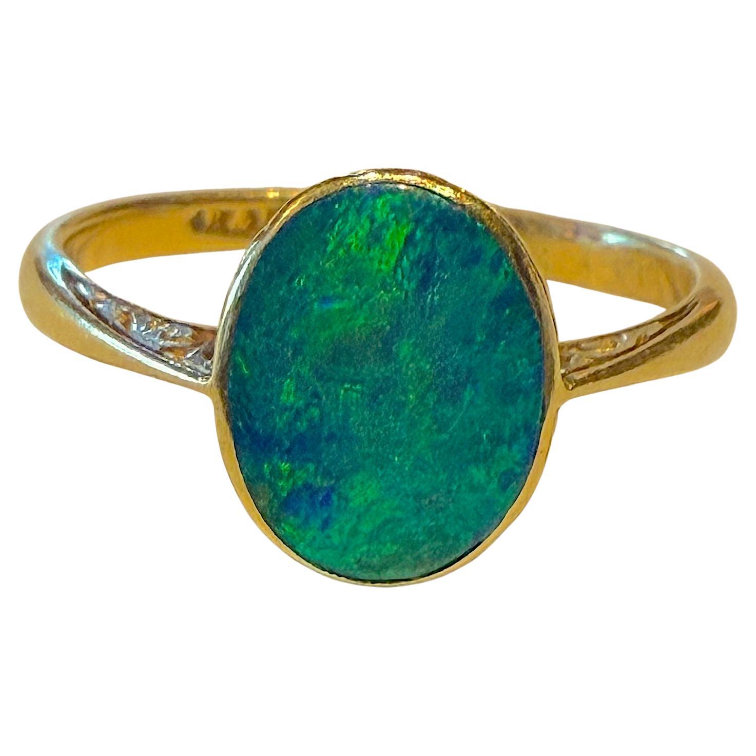 C1910 18K Lightening Ridge Australian Single Stone Peacock Feather Opal Ring