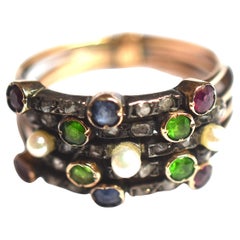 C1910 Bague Harem sertie de pierres multiples