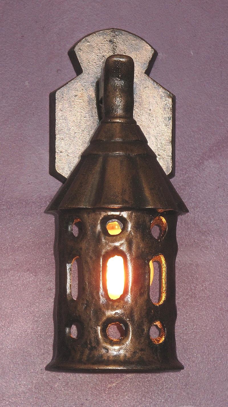 Wonderful antique porch lighting fixtures for your porch. Priced each with several available.
Made of almost indestructible cast iron with a vintage Cottage feel. They came as shown, original without any shades. These heavyweights will anchor the