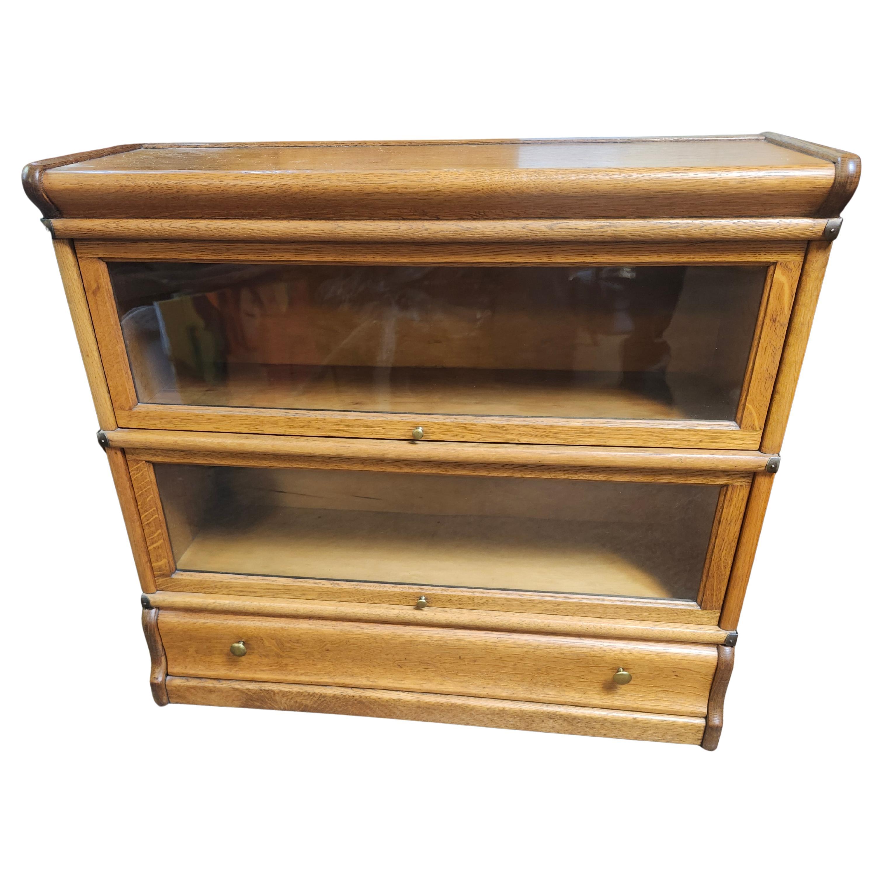 C1920 Oak 4 Section Barrister Stacking Bookcase with a Drawer By Globe Wernicke For Sale
