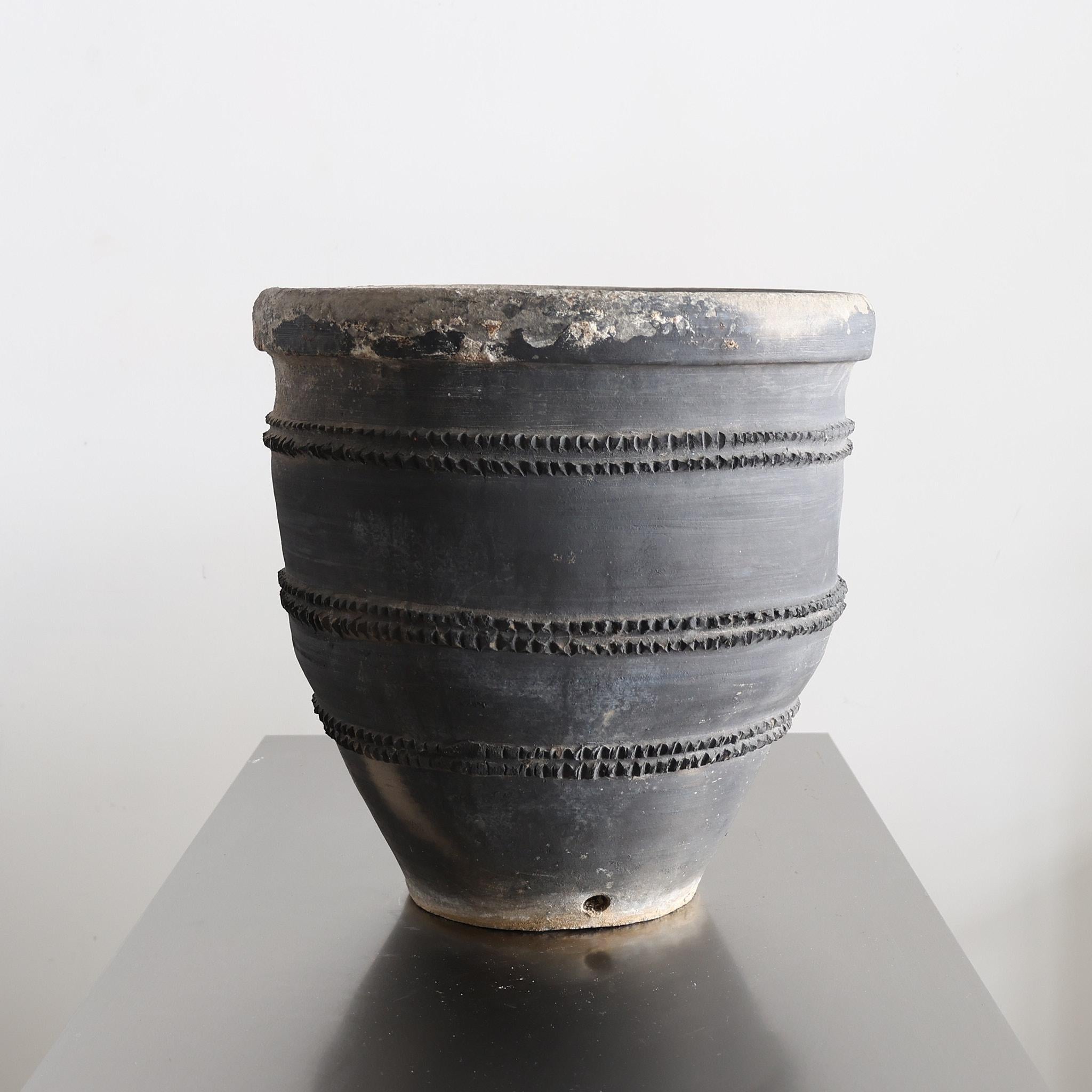 A C.1920s black Catalan terracotta cosi pot from the village of Quart.

Originally used for the storage of wine &/or olive oil.

Nicely patinated due to 100 years of use.

Part of a recently purchased collection of eight from the same village.