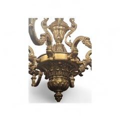 Lampadario a otto rami in bronzo dorato in stile Reggenza del 1920