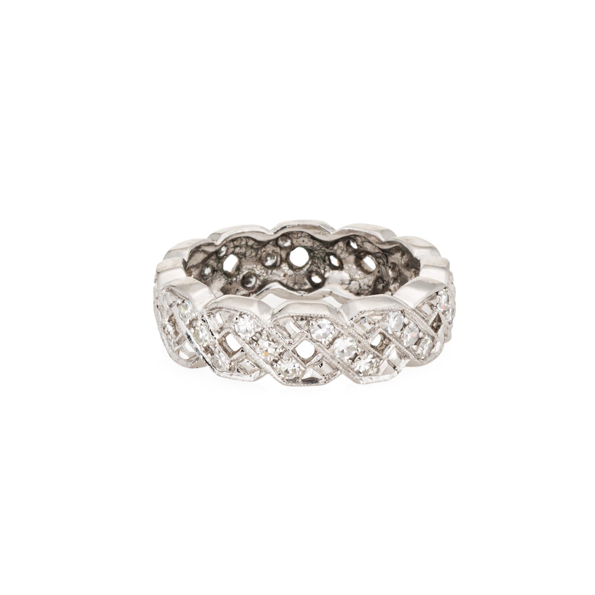 Elegant vintage Art Deco era ring (circa 1920s), crafted in 900 platinum. 

Single cut diamonds total an estimated 0.65 carats (estimated at I-J color and VS2-I1 clarity).

The ring epitomizes vintage charm and would make a lovely wedding band,