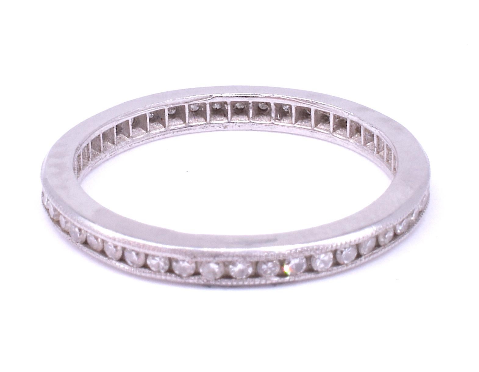 Our C1930 diamond platinum eternity band is a slim polished band that packs a lot of punch! Notice how just a sliver of a ring glimmers and sparkles on the hand. Eternity bands, with their continuous line of identical gemstones circling the band,
