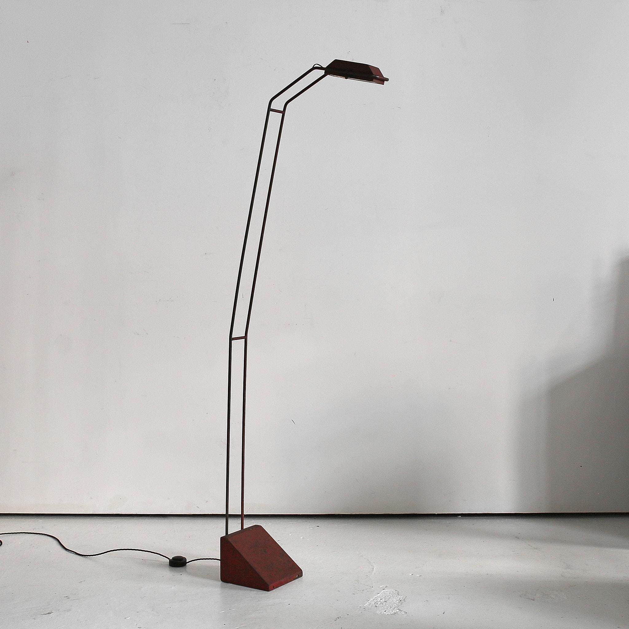 A 1950s northern Italian standard lamp.

Constructed in steel with adjustable pivoting shade.

Beautifully patinated original oxblood paint finish.

Recently professionally re-wired/PAT tested.

Price includes rewiring for USA/Europe.