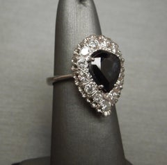Classic 2.38 Carat Pear Sapphire Solitaire and Diamond Halo Ring