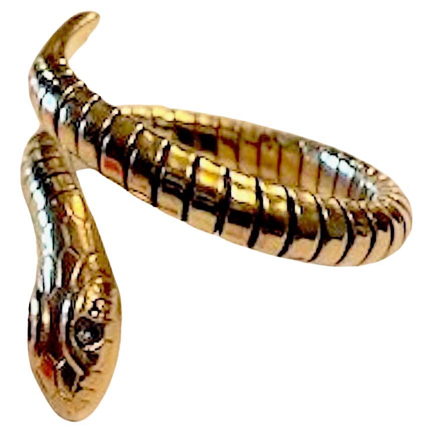 c1960 Anello flessibile con serpente arrotolato e occhi di Greene & Greene, misura da 7 a 10 in vendita