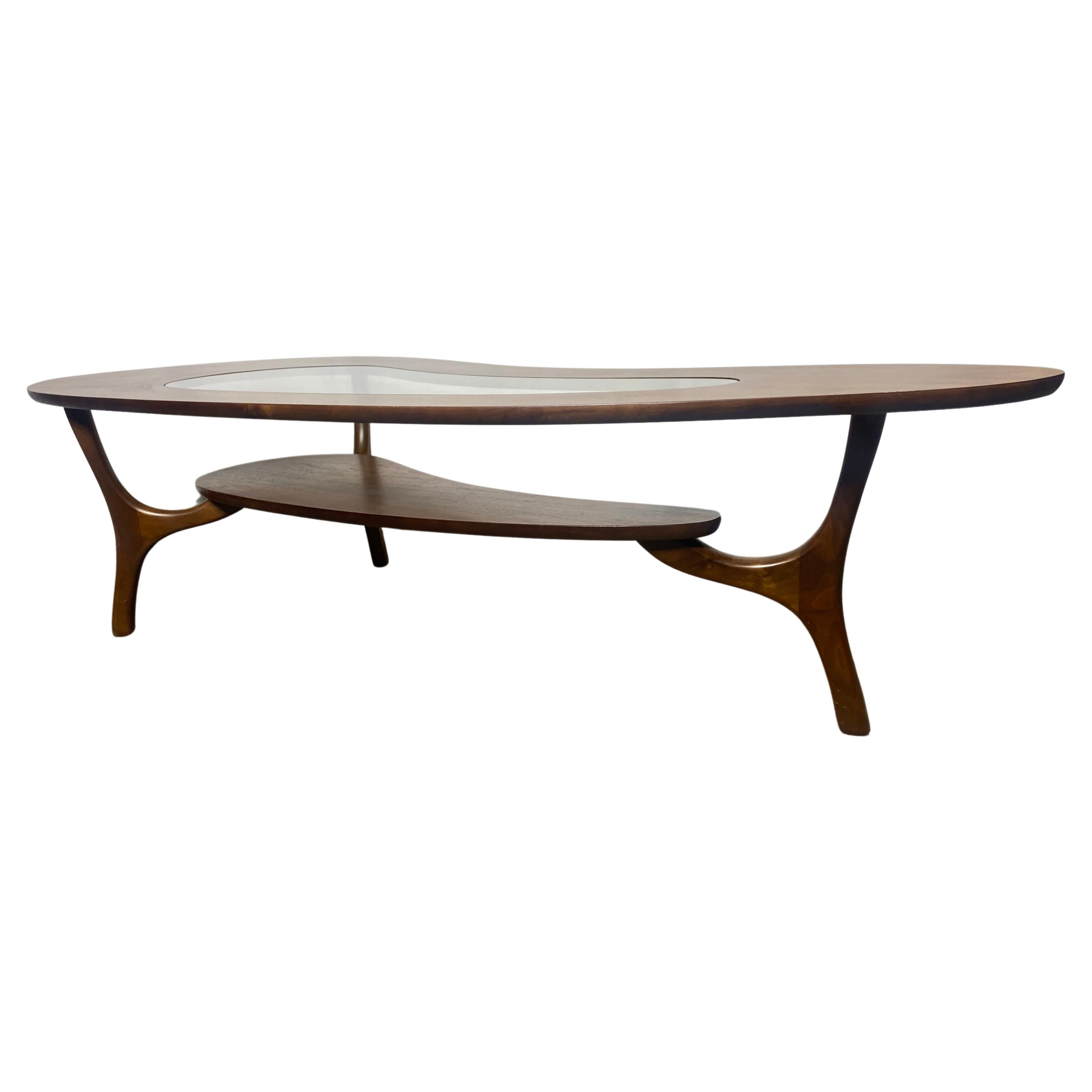 c.1960 kidney shaped, 2 tiered coffee table with sculptural legs & glass insert  For Sale