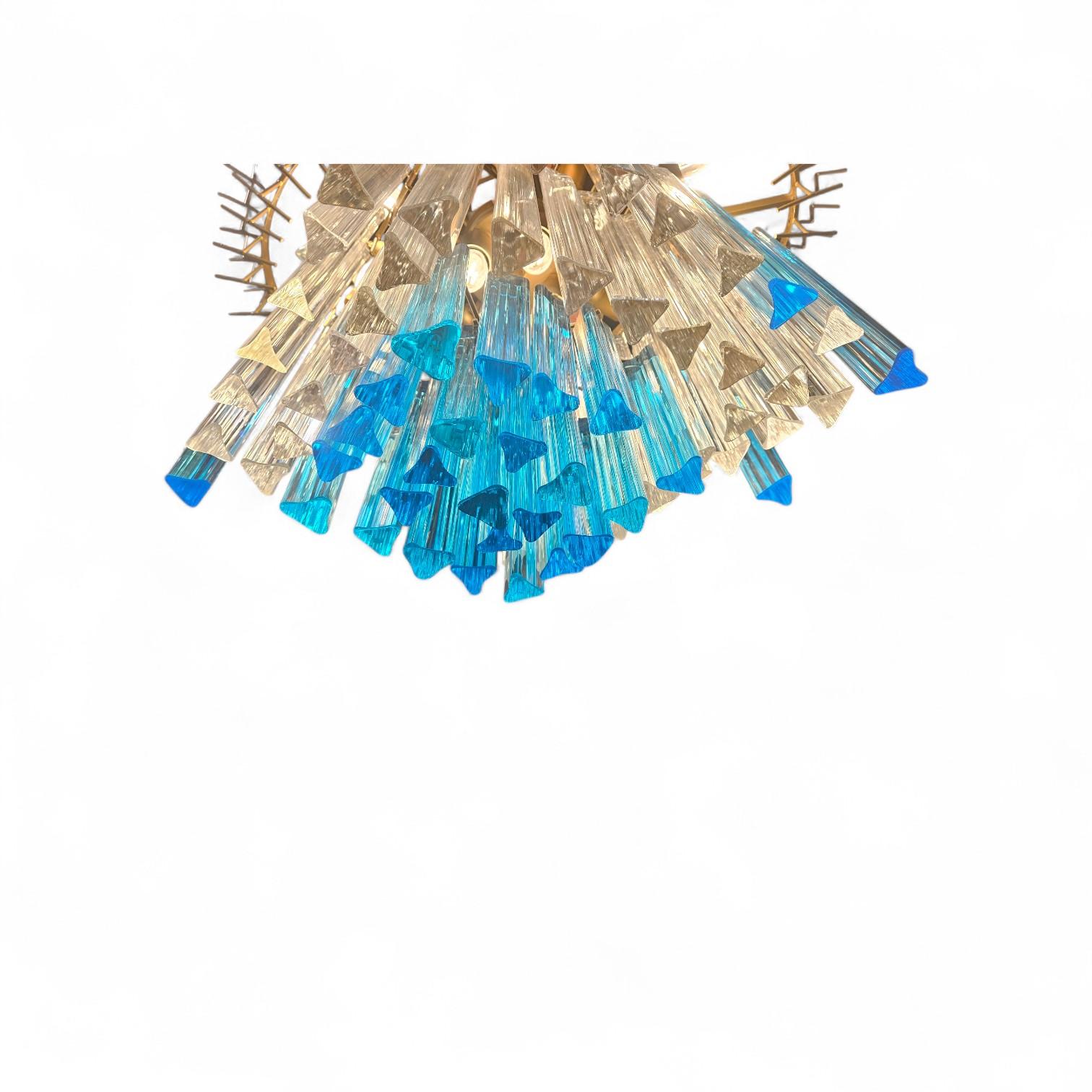 Beautiful Aqua Blue Crystal Chandelier attributed to Venini
These chandeliers are also Called Tronchi
Lovely Blue Turquoise Murano Prisms
C1960s
Rewired
