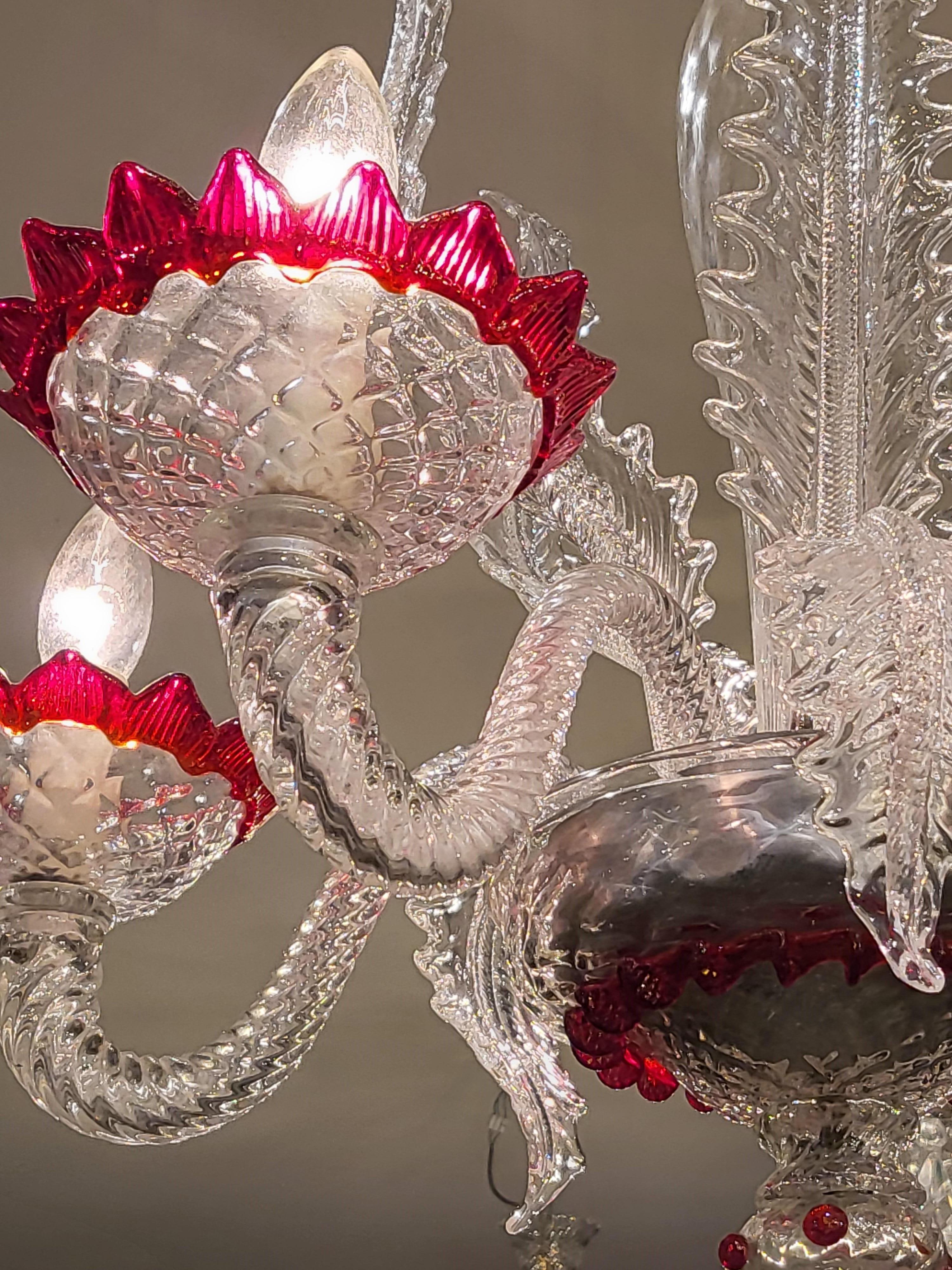 Vintage Four Branch Murano Chandelier
Series of Arms and Floral Stems that Come from the Central Column
This Chandelier is Hand Blown 
Dates C1960s