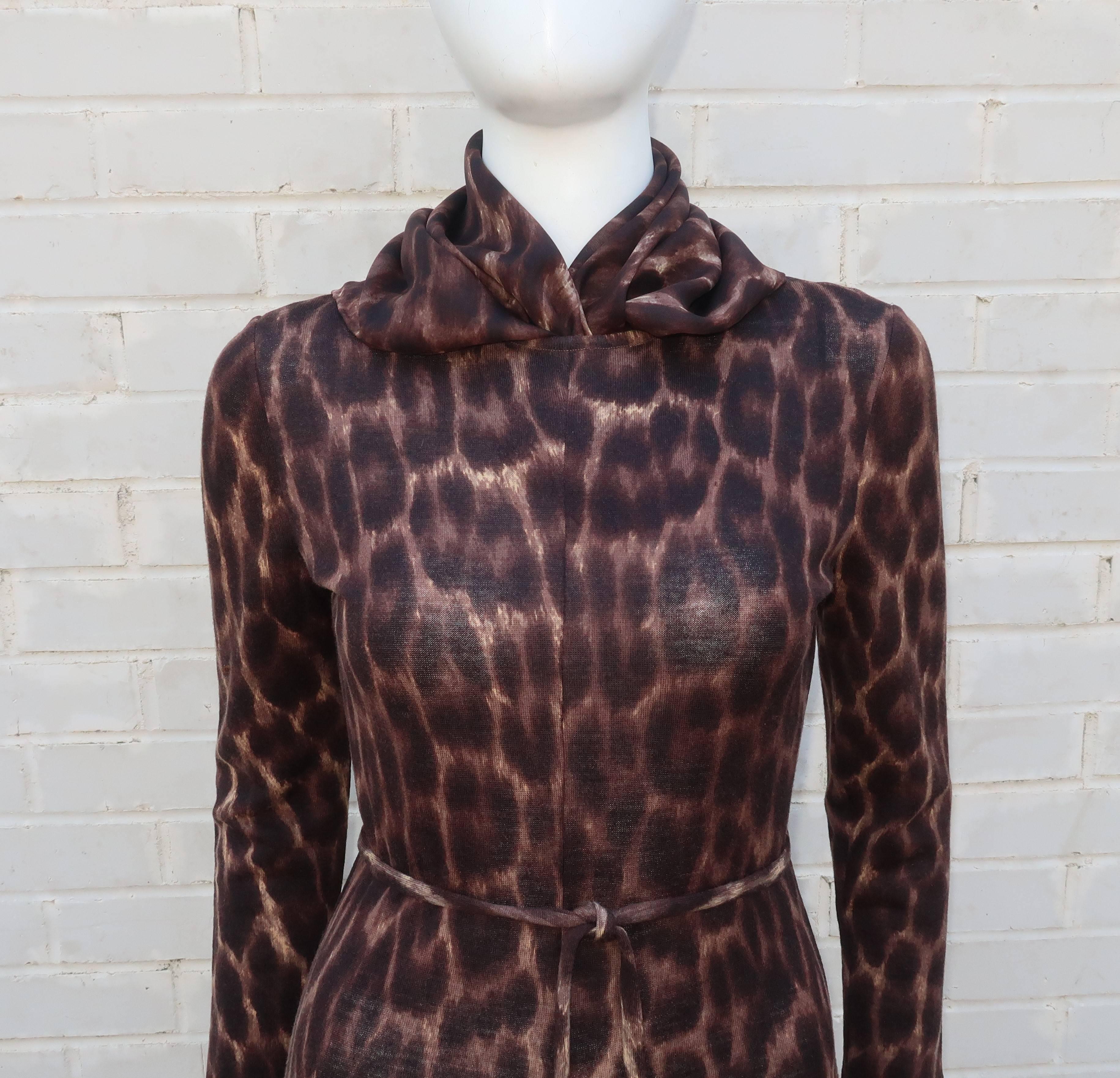 Purrrrrfect!  If Catwoman needs a 'ladies who lunch' ensemble ... this animal printed wool knit dress by Goldworm with scarf and belt is it!  The simple dress zips and hooks at the back with a collarless neckline and a flared skirt all in a cheetah